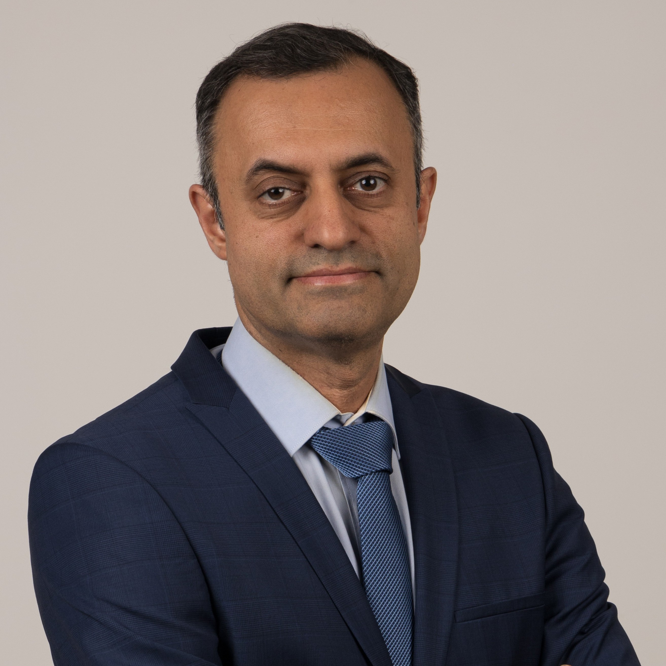 Dr. Amir Tavajohi